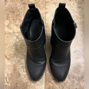 Black leather heeled boots